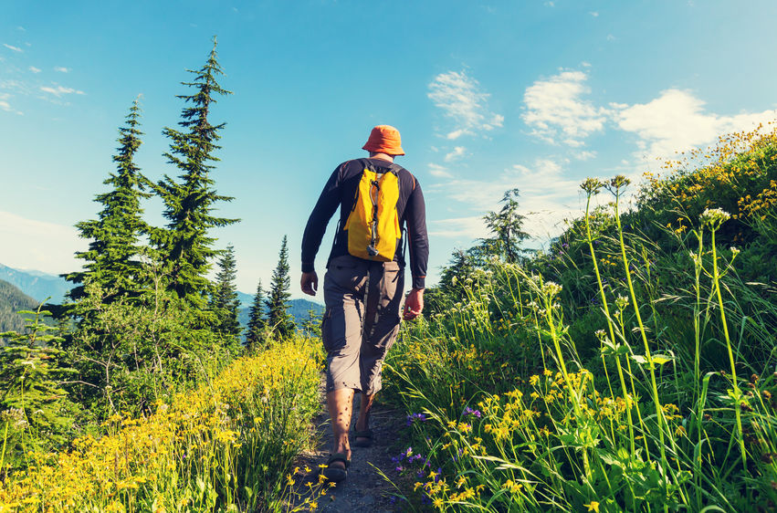 Hiking man in the mountains